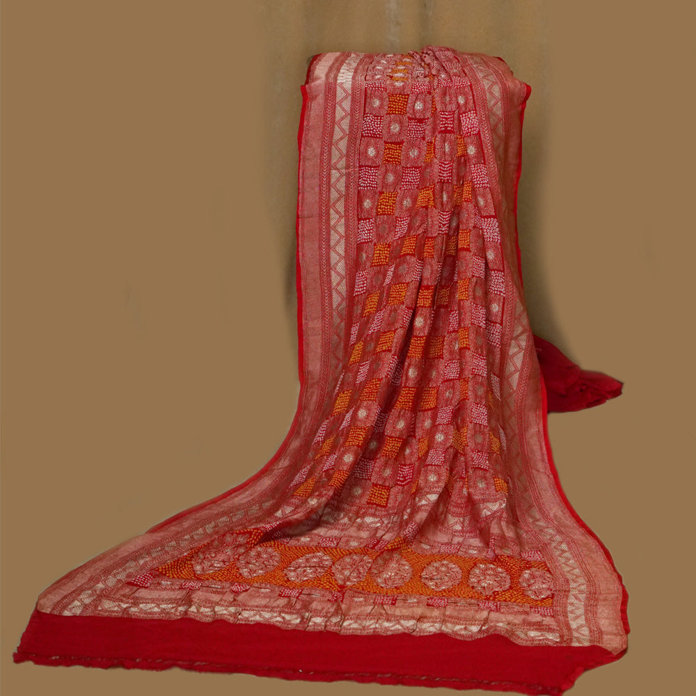Dhirit – handcrafted red Bandhni saree by My Motifs