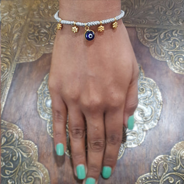 Dual Toned Evil Eye Bracelet With Gold Charms – handcrafted dual-tone 92.5 sterling silver bracelet by My Motifs