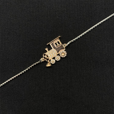 Train Charm Rakhi – handcrafted 92.5 sterling silver rakhi by My Motifs