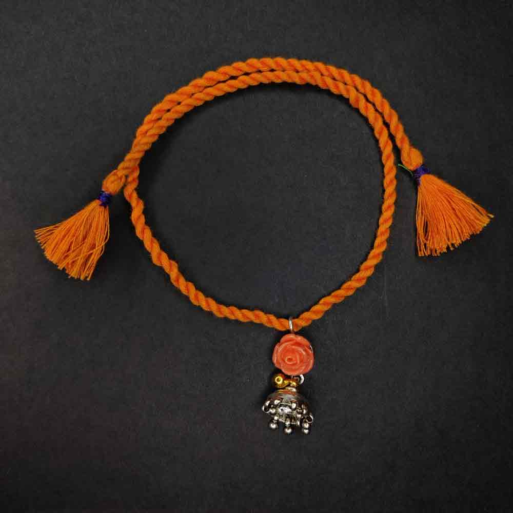 Orange Lumba Rakhi With Gold Jhumka – handcrafted 92.5 sterling silver rakhi by My Motifs