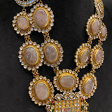 Close view of Yutav kundan pendant and rose-quartz mala