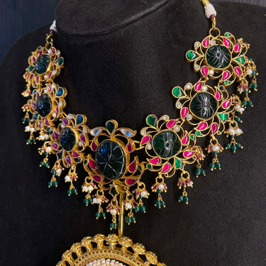 Uvana statement necklace showing emerald and semi-precious stone details