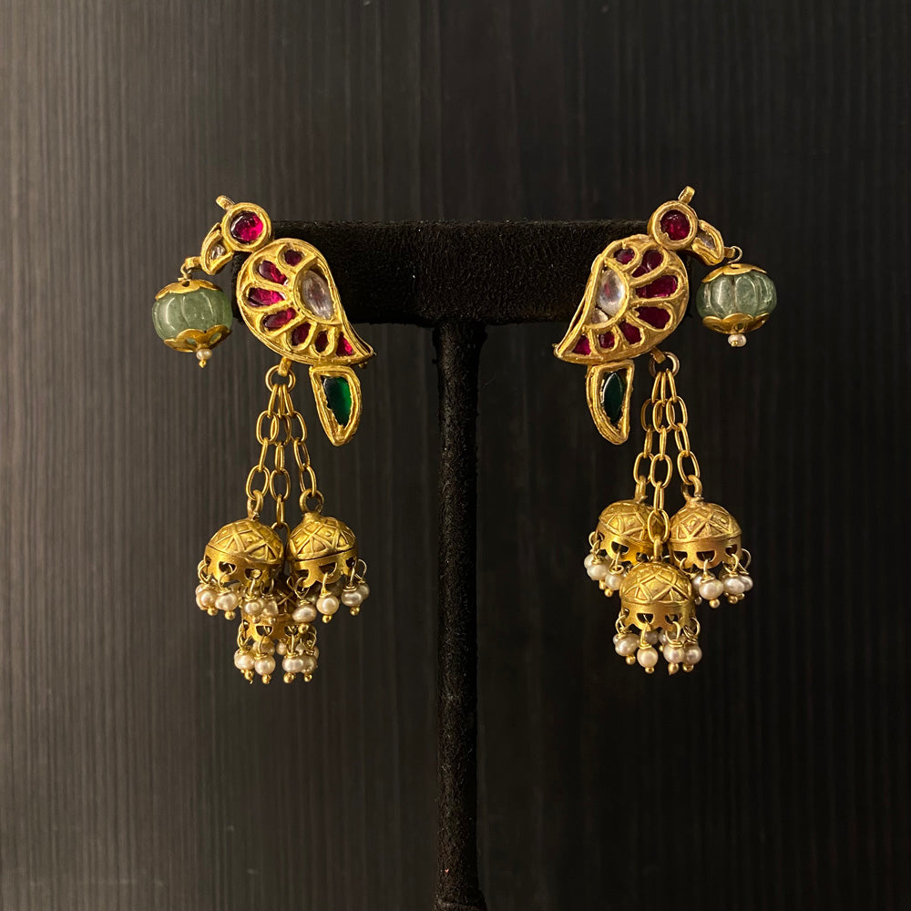 Gold-tone parrot-shaped jhumka earrings with pink and green accents and white bead drops – My Motifs