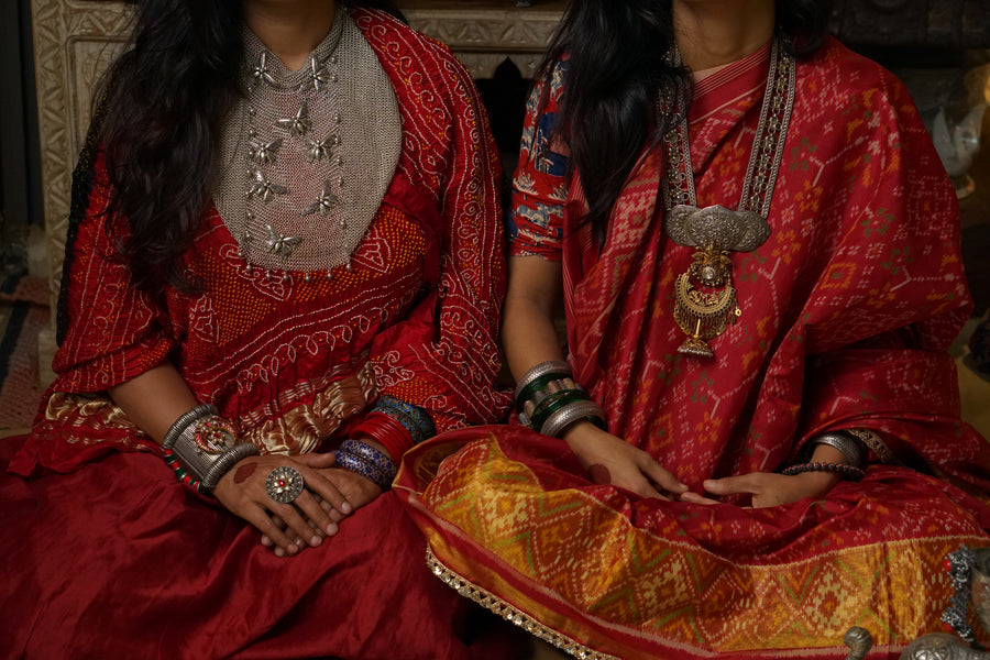 Motifs handcrafted silver jewellery, worn with traditional Indian dress